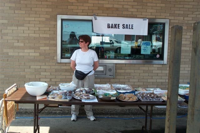 Carol helping with the bake sale